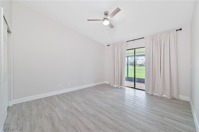 unfurnished room featuring light wood-style floors, baseboards, and ceiling fan