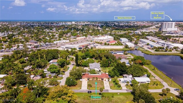 birds eye view of property featuring a water view