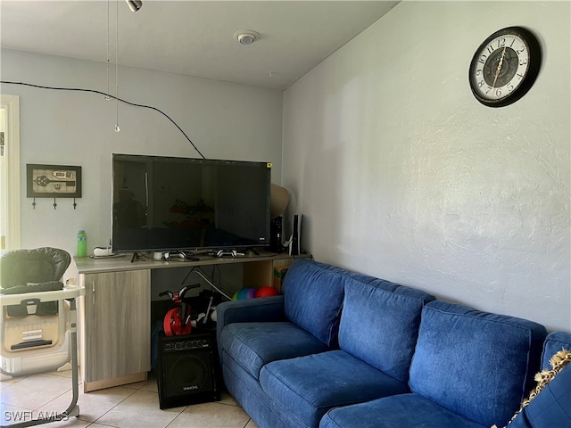 living room with light tile patterned flooring