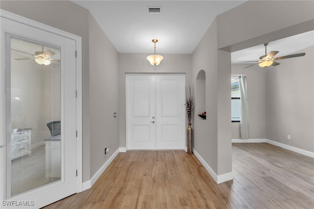 entrance foyer featuring ceiling fan and light hardwood / wood-style floors