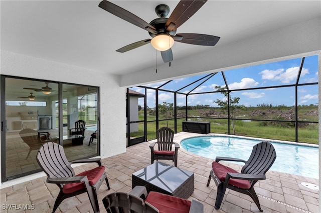 view of pool with ceiling fan