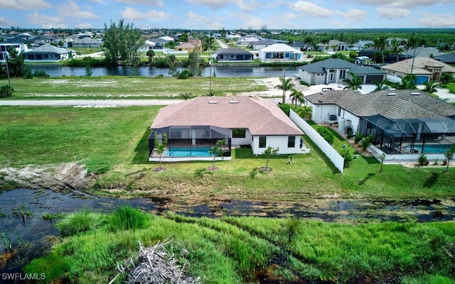 drone / aerial view with a water view