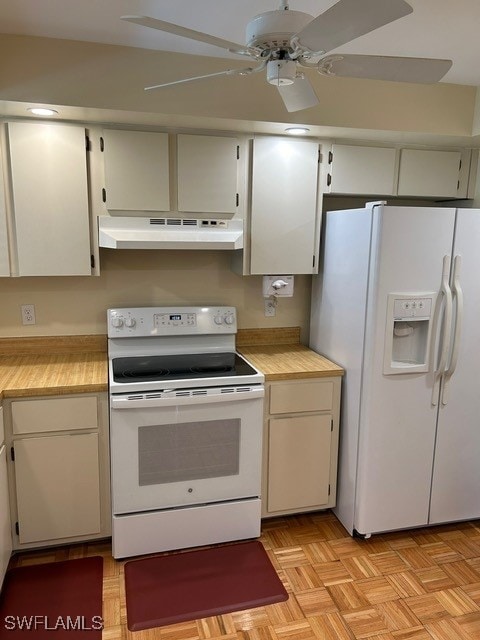 kitchen featuring white cabinetry, light parquet floors, white appliances, and ceiling fan