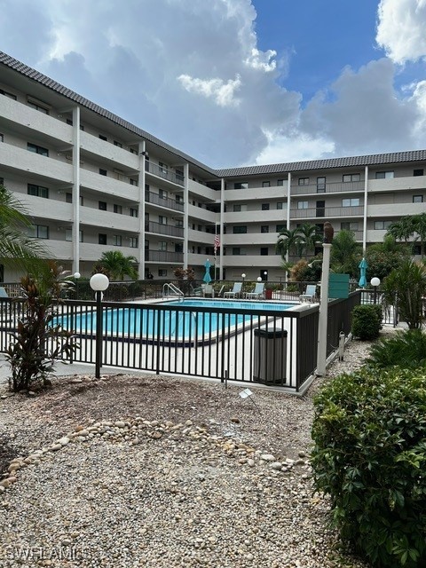 community pool with fence