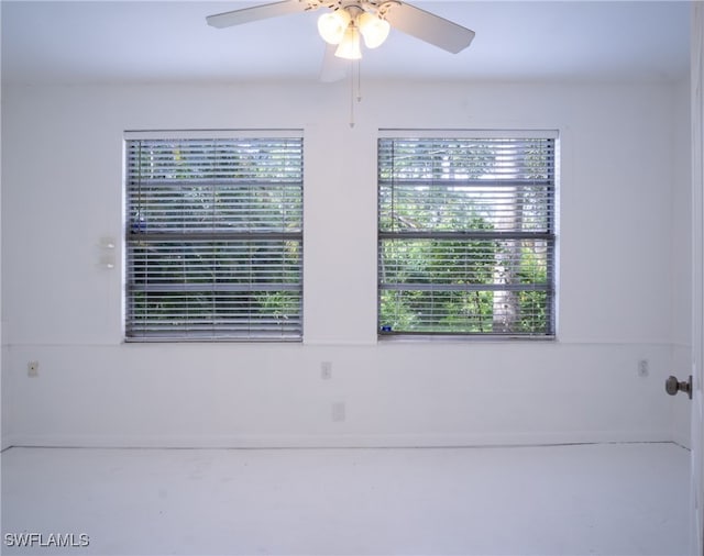 interior space featuring ceiling fan