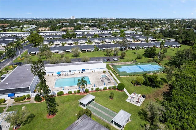 birds eye view of property with a residential view