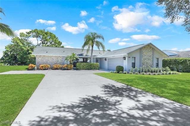 ranch-style house with a garage and a front lawn