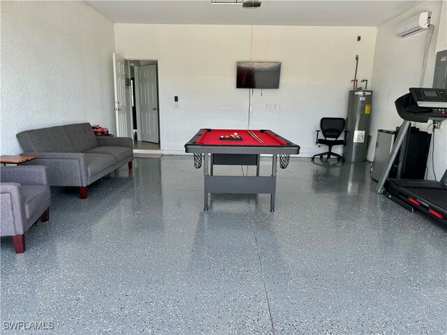 game room with electric water heater, billiards, and a wall mounted air conditioner