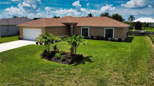 ranch-style home featuring a garage and a front lawn