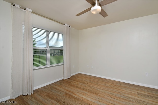 unfurnished room featuring ceiling fan and light hardwood / wood-style floors