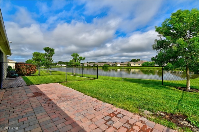 view of patio / terrace featuring a water view