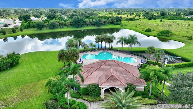 view of swimming pool with a water view