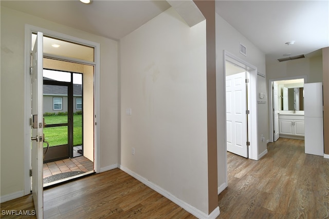 foyer entrance featuring light hardwood / wood-style flooring