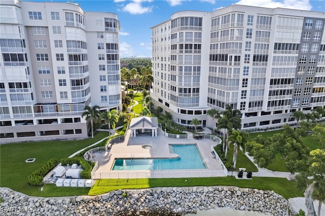 view of property with a community pool