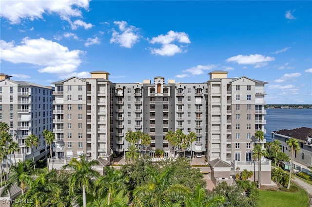 view of building exterior with a water view