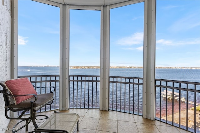 sunroom with a water view