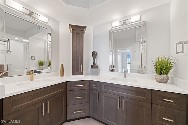 bathroom featuring vanity and hardwood / wood-style floors