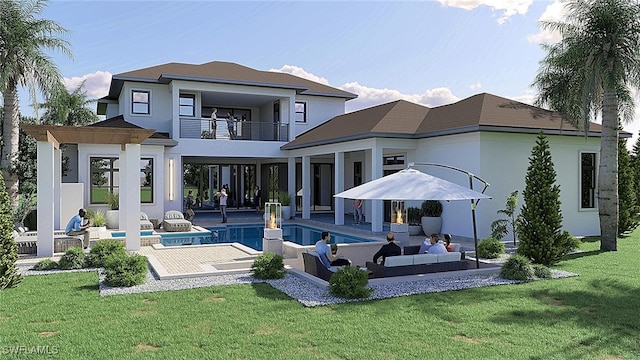 back of property with a balcony, an outdoor pool, stucco siding, a yard, and a patio area