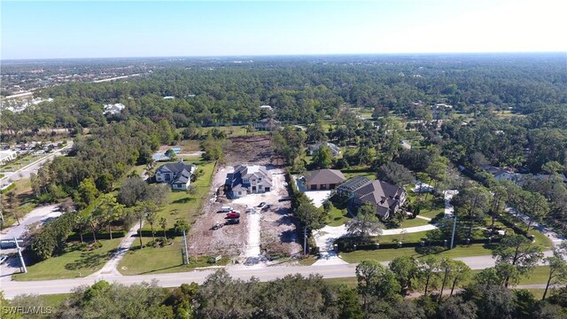 aerial view with a wooded view