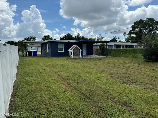 exterior space featuring a carport