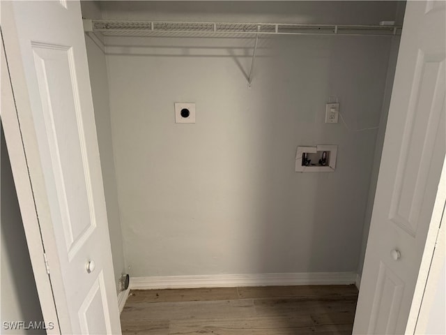 laundry room with washer hookup, wood-type flooring, and hookup for an electric dryer