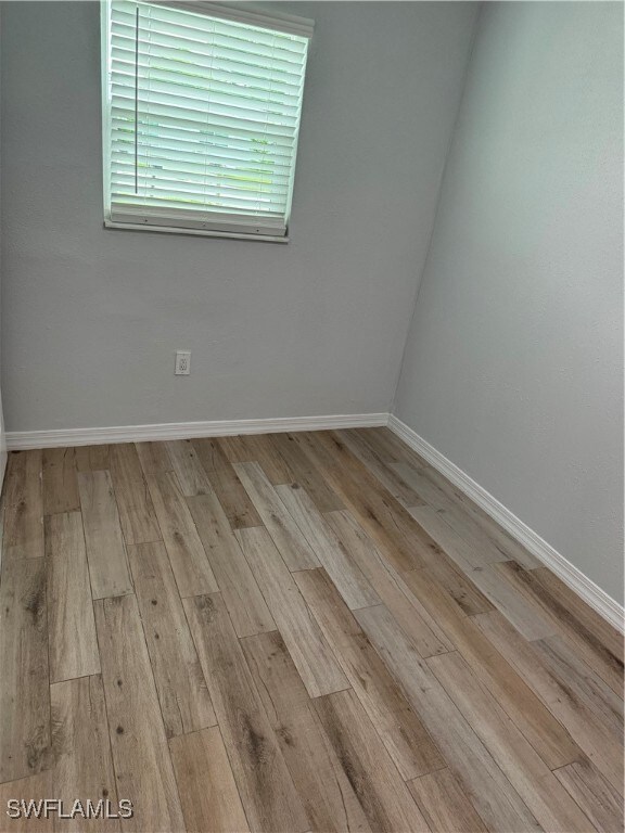 empty room featuring light hardwood / wood-style floors