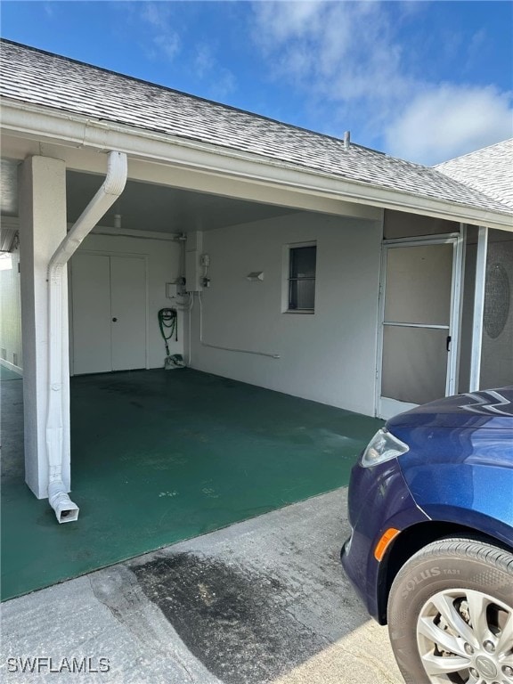 garage with a carport