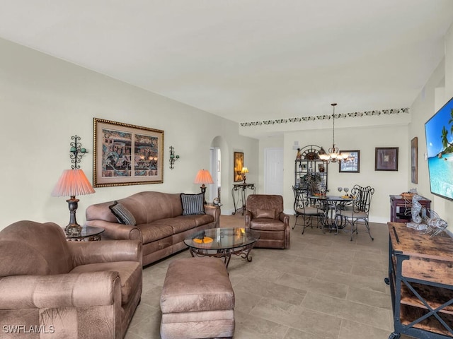 living room featuring an inviting chandelier