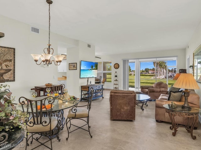 dining area with a chandelier