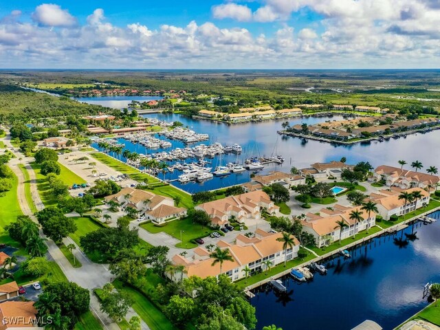 drone / aerial view with a water view