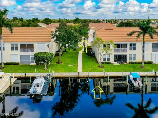 drone / aerial view with a water view