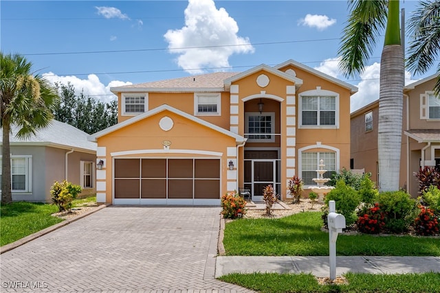 view of front of property featuring a garage