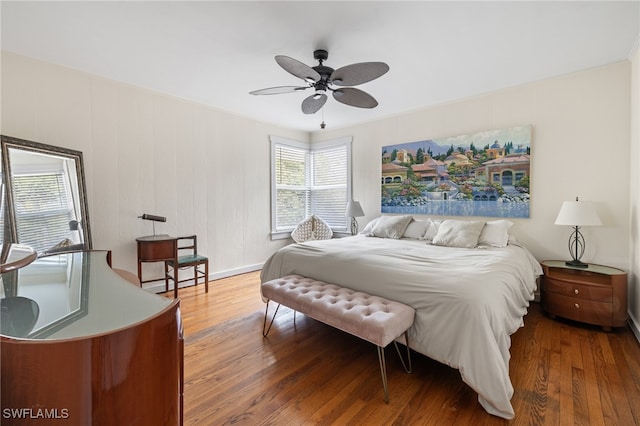 bedroom featuring hardwood / wood-style flooring and ceiling fan