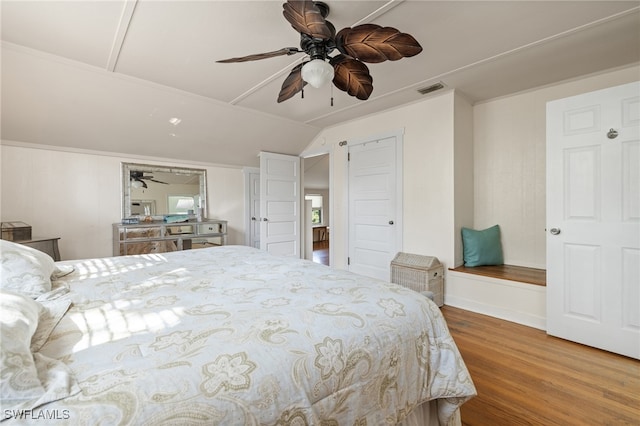 bedroom featuring wood-type flooring and ceiling fan