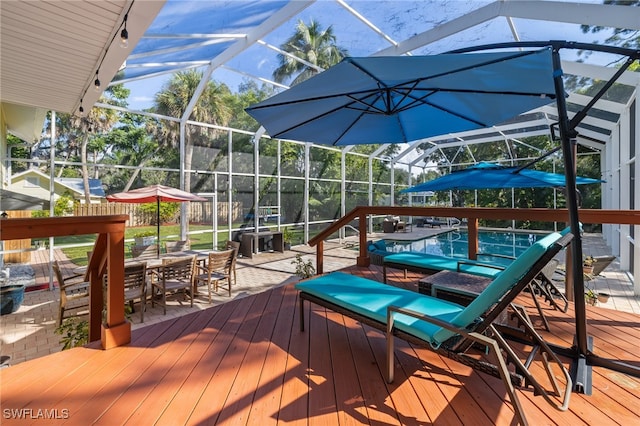 wooden terrace featuring a lanai