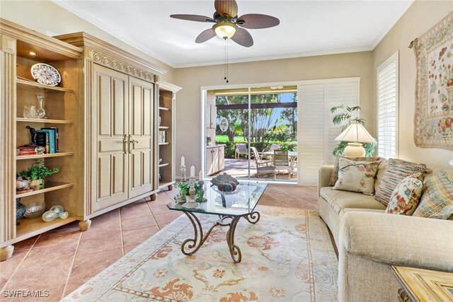 living room featuring light tile patterned floors, ceiling fan, and ornamental molding