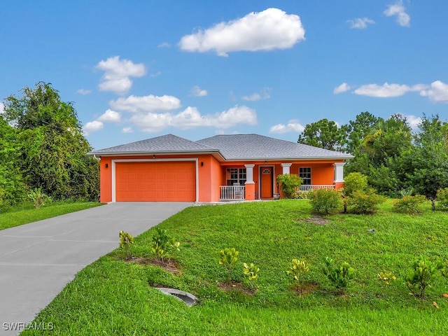 view of front of house featuring a garage, a porch, and a front lawn