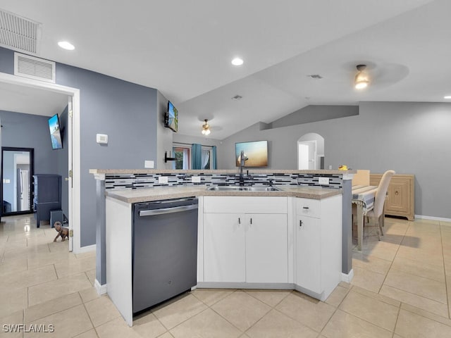 kitchen with white cabinets, sink, stainless steel dishwasher, and ceiling fan