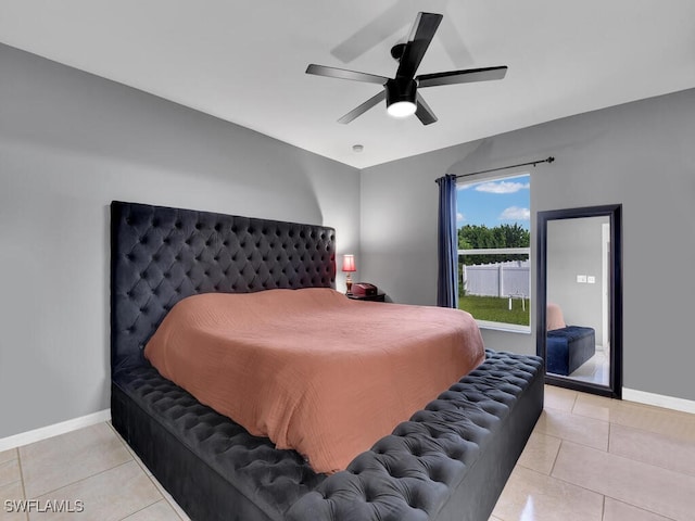 bedroom featuring ceiling fan and light tile patterned flooring