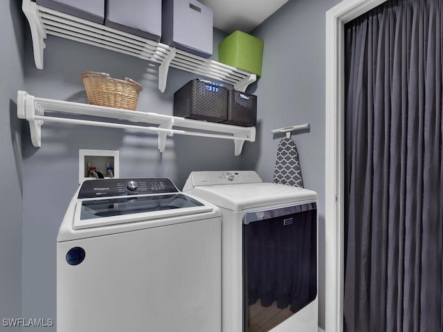 laundry room featuring washer and dryer