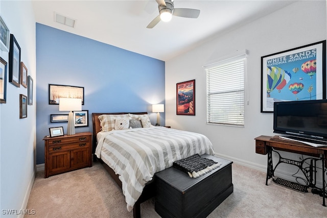 carpeted bedroom featuring ceiling fan