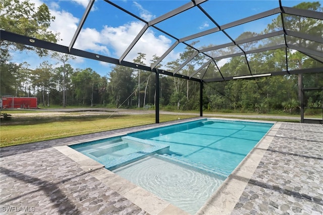 view of swimming pool with a patio area, a yard, and a lanai