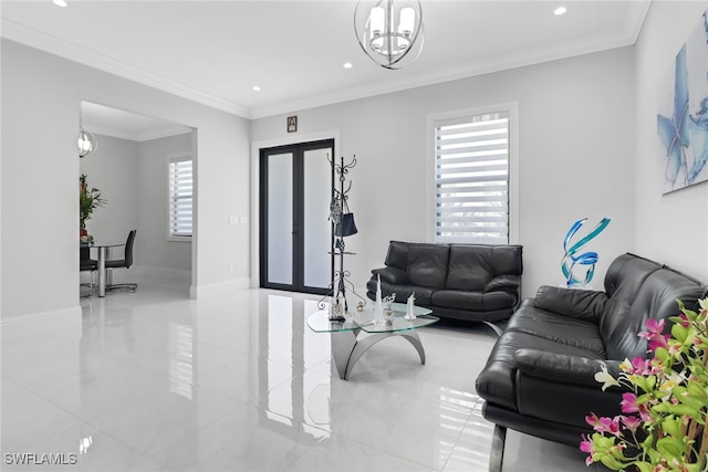 living room featuring an inviting chandelier and ornamental molding