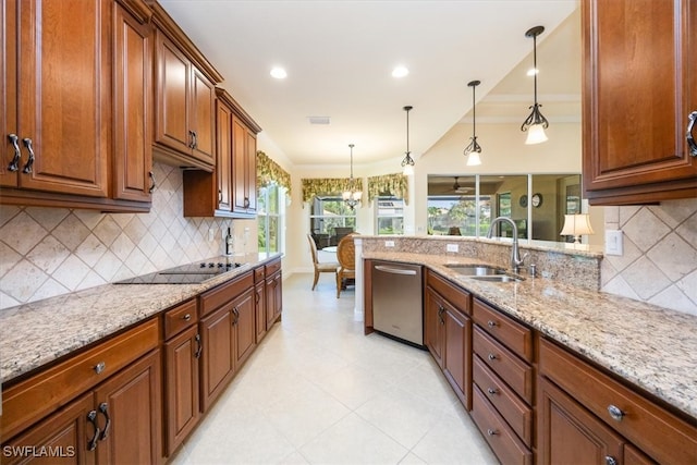 kitchen with sink, decorative light fixtures, dishwasher, light stone countertops, and a chandelier