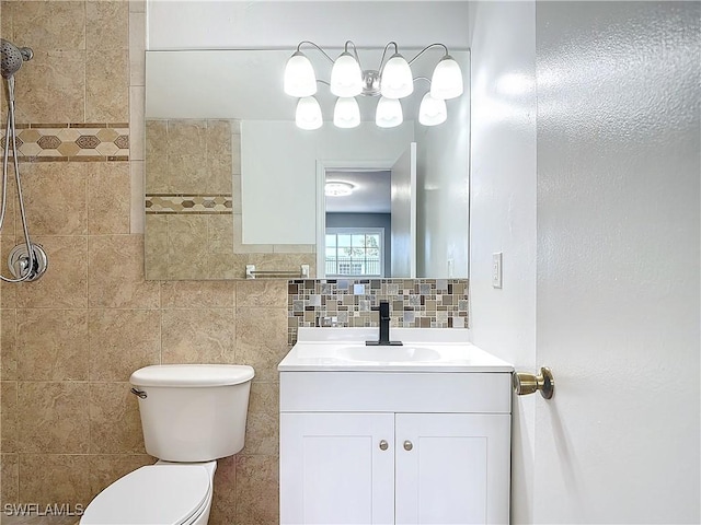 4802 Albacore Ln, Fort Myers, FL 33919 - bathroom with tasteful backsplash, tiled shower, toilet, and vanity