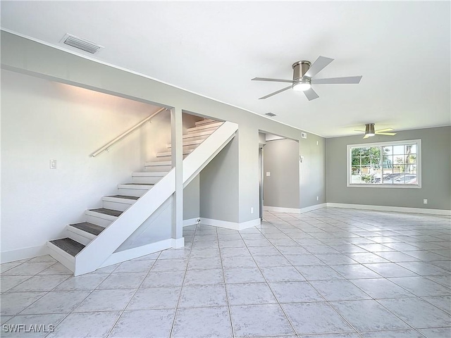 interior space featuring ceiling fan and light tile patterned floors