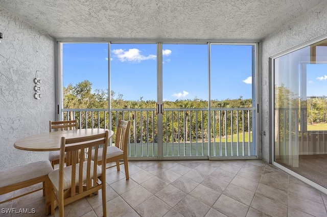 sunroom / solarium with plenty of natural light