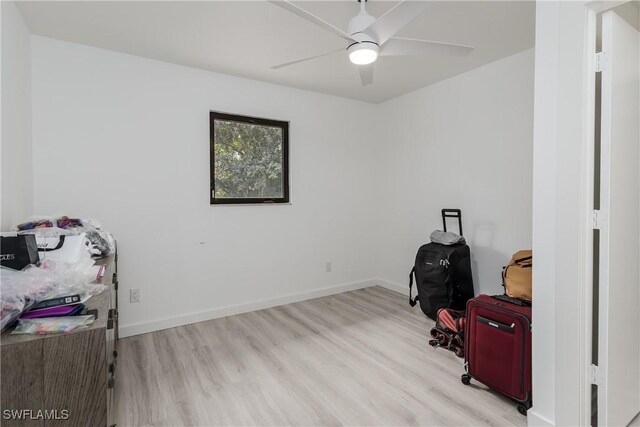 misc room featuring ceiling fan and light hardwood / wood-style flooring