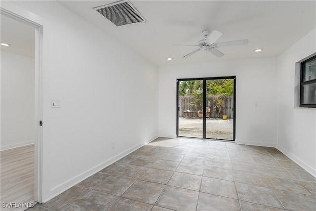 empty room featuring ceiling fan