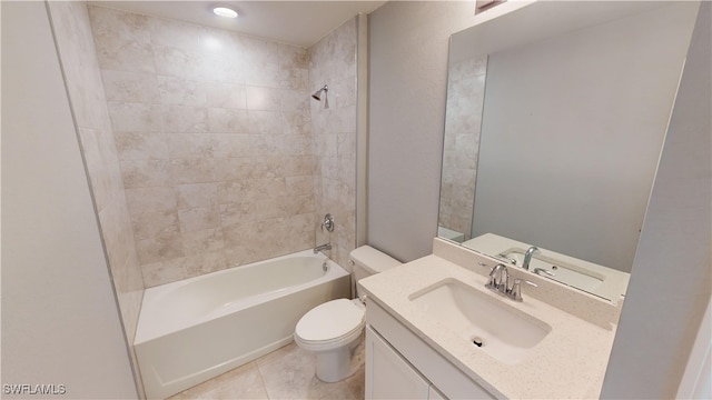 full bathroom with tile patterned flooring, vanity, toilet, and tiled shower / bath